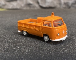 Skala 1/87 - Volkswagen T2 Folka Transporter, Orange m Grått flak från Wiking