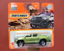Skala 1/64 Matchbox - Toyota Hilux 2018