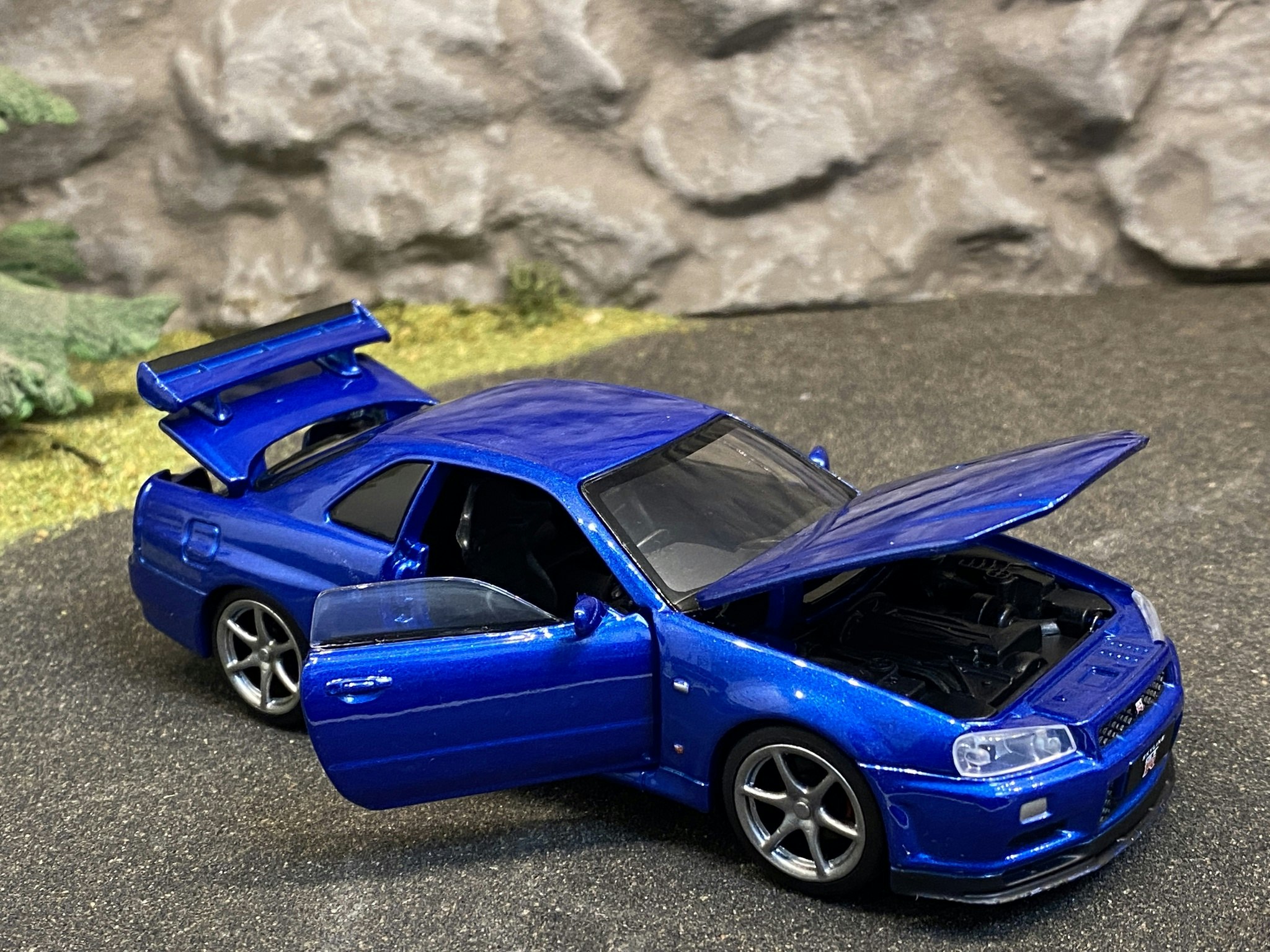 Skala 1/32 Nissan GT-R34 V-spec II, Blå, från Tayumo