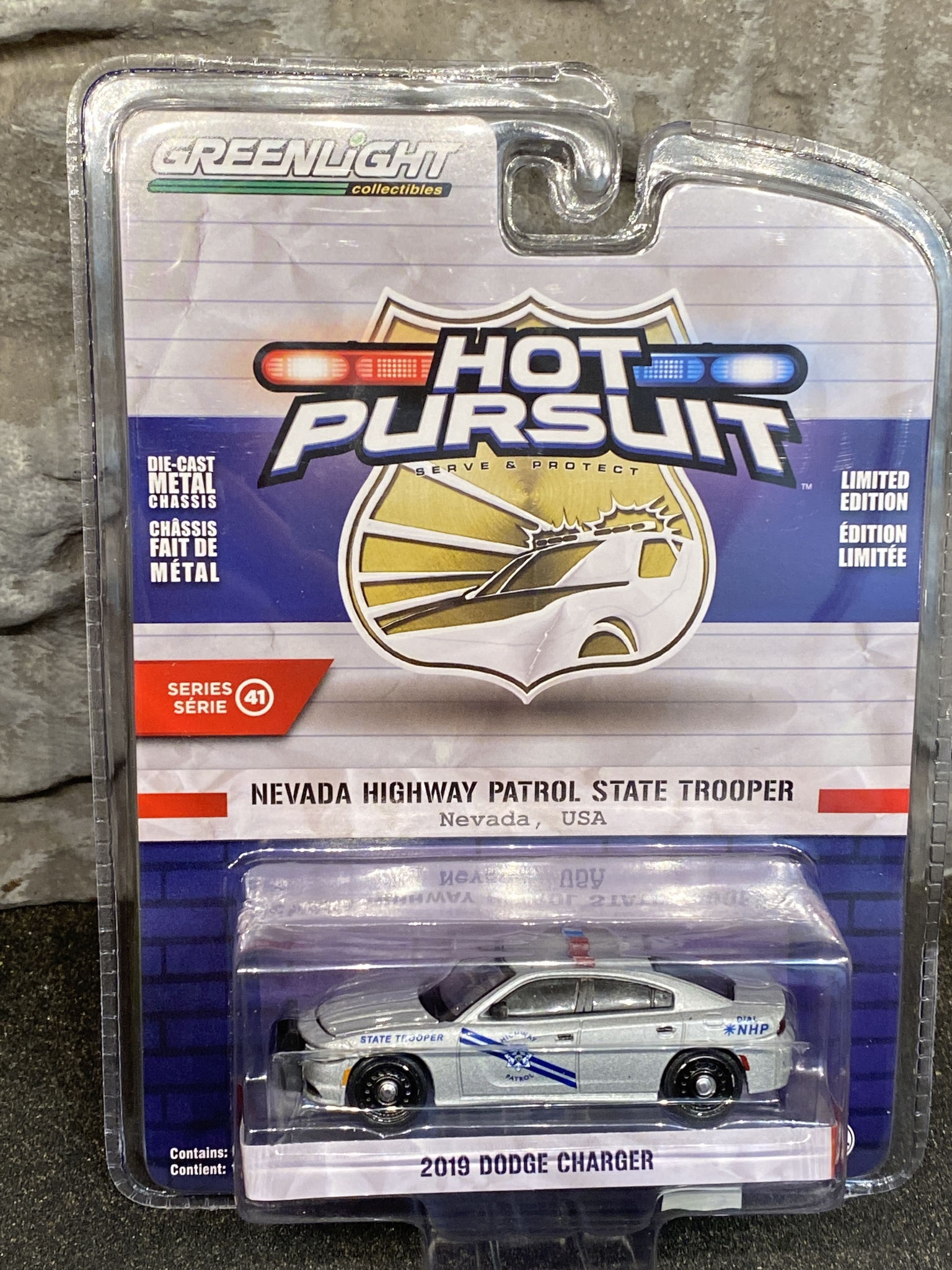 Skala 1/64 Dodge Charger 2019 Nevada State Trooper "Hot Pursuit" från Greenlight