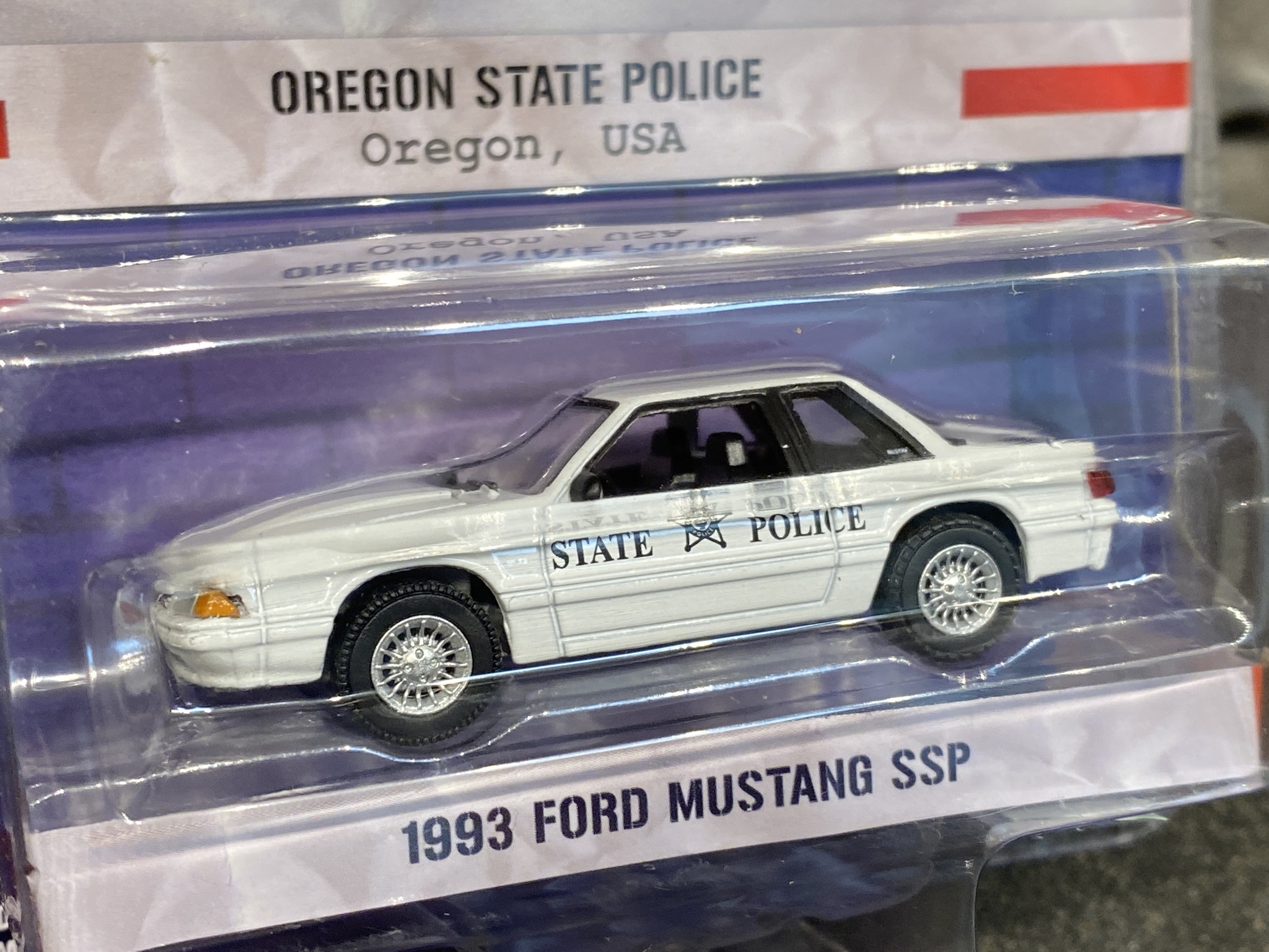 Skala 1/64 Ford Mustang 93' Oregon State Police "Hot Pursuit" från Greenlight