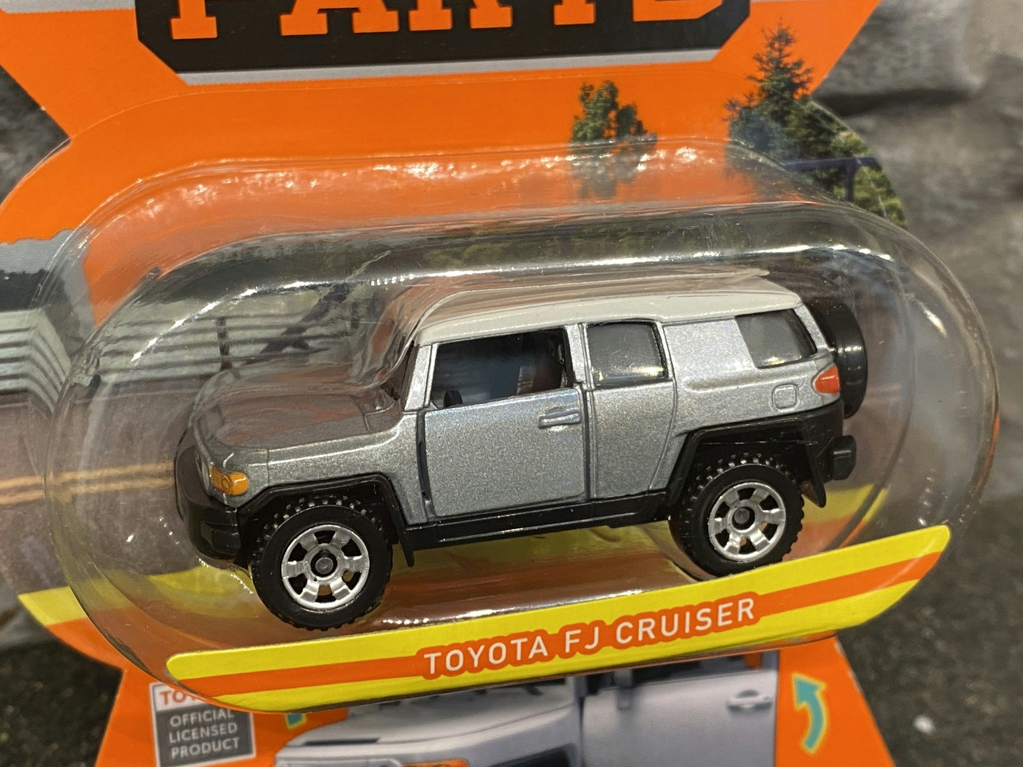 Skala 1/64 Matchbox "Moving parts" - Toyota FJ Cruiser