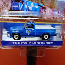 Skala 1/64 Chevrolet C-10 Custom Deluxe CONRAIL Police från Greenlight Exclusive