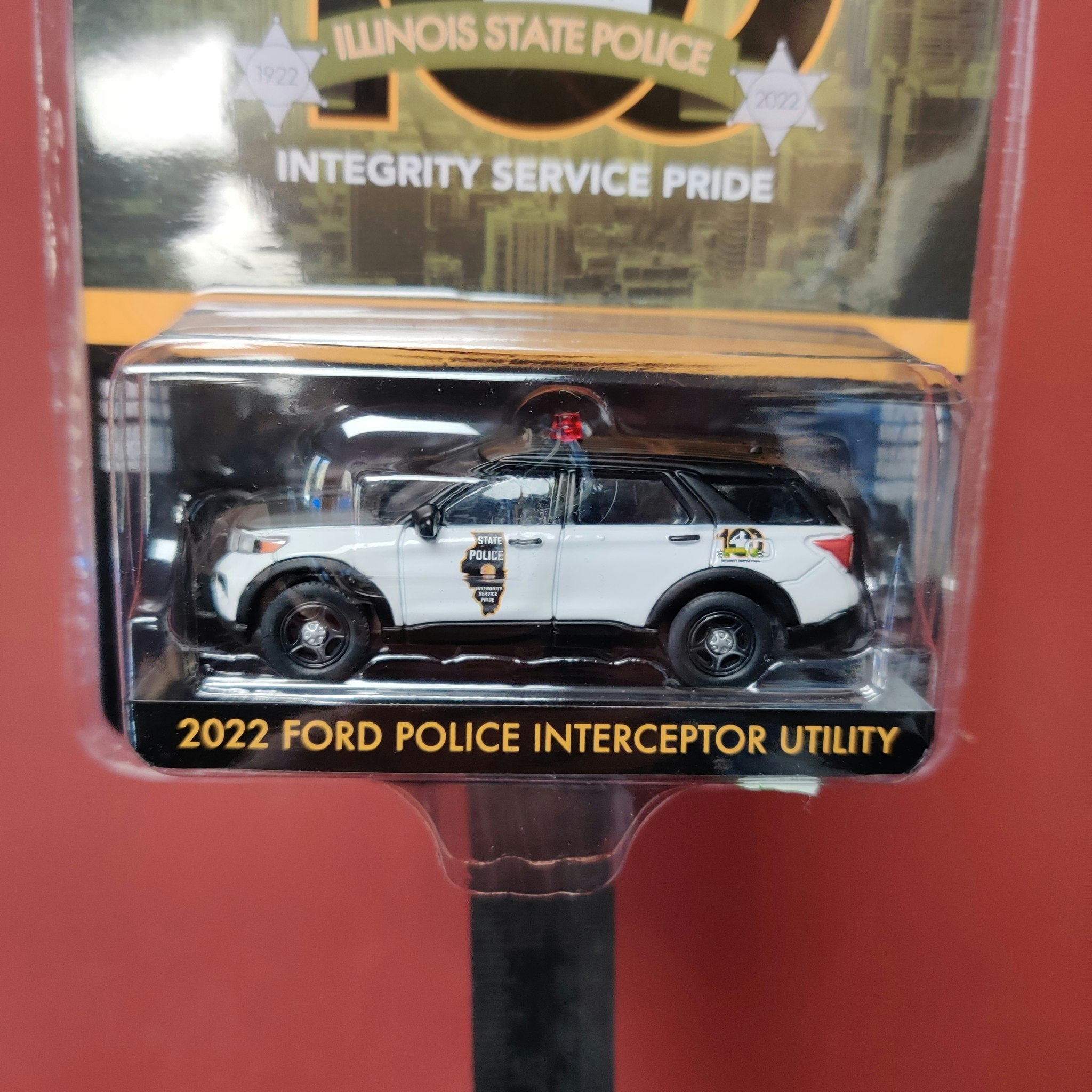 Skala 1/64 Ford Police Interceptor Utility 22' - "Illinois State Police" från Greenlight