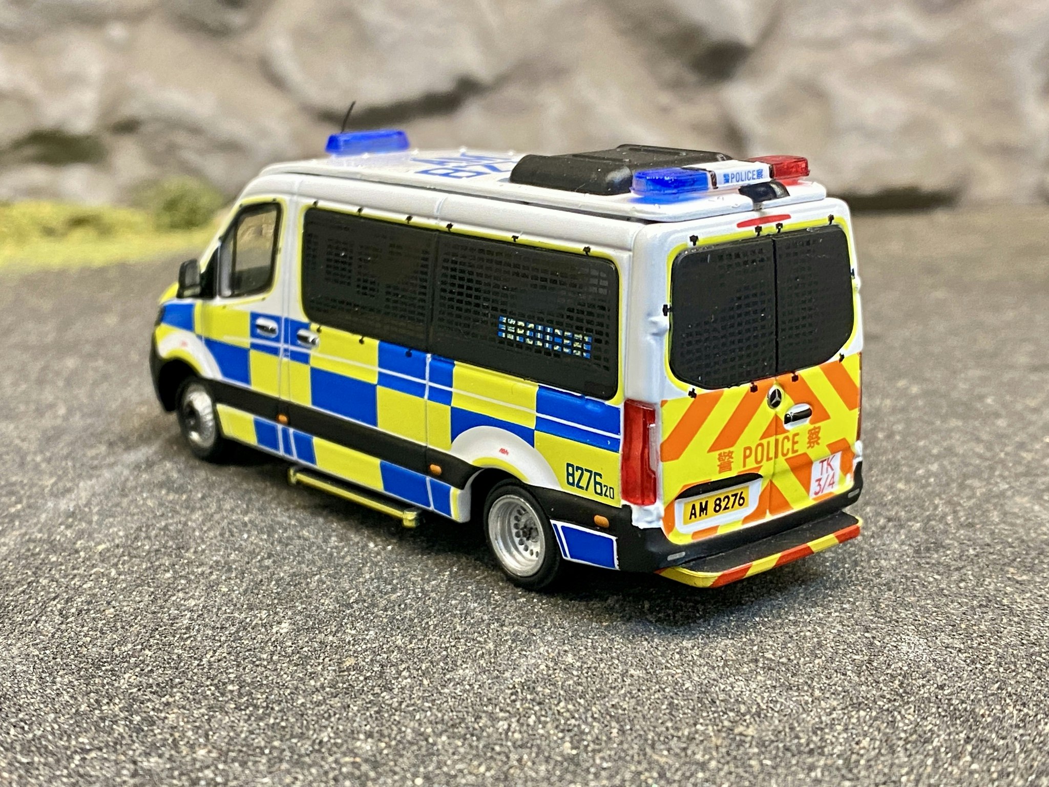 Skala 1/64 Fin Mercedes Benz Sprinter HK Police car #52 från ERA CAR