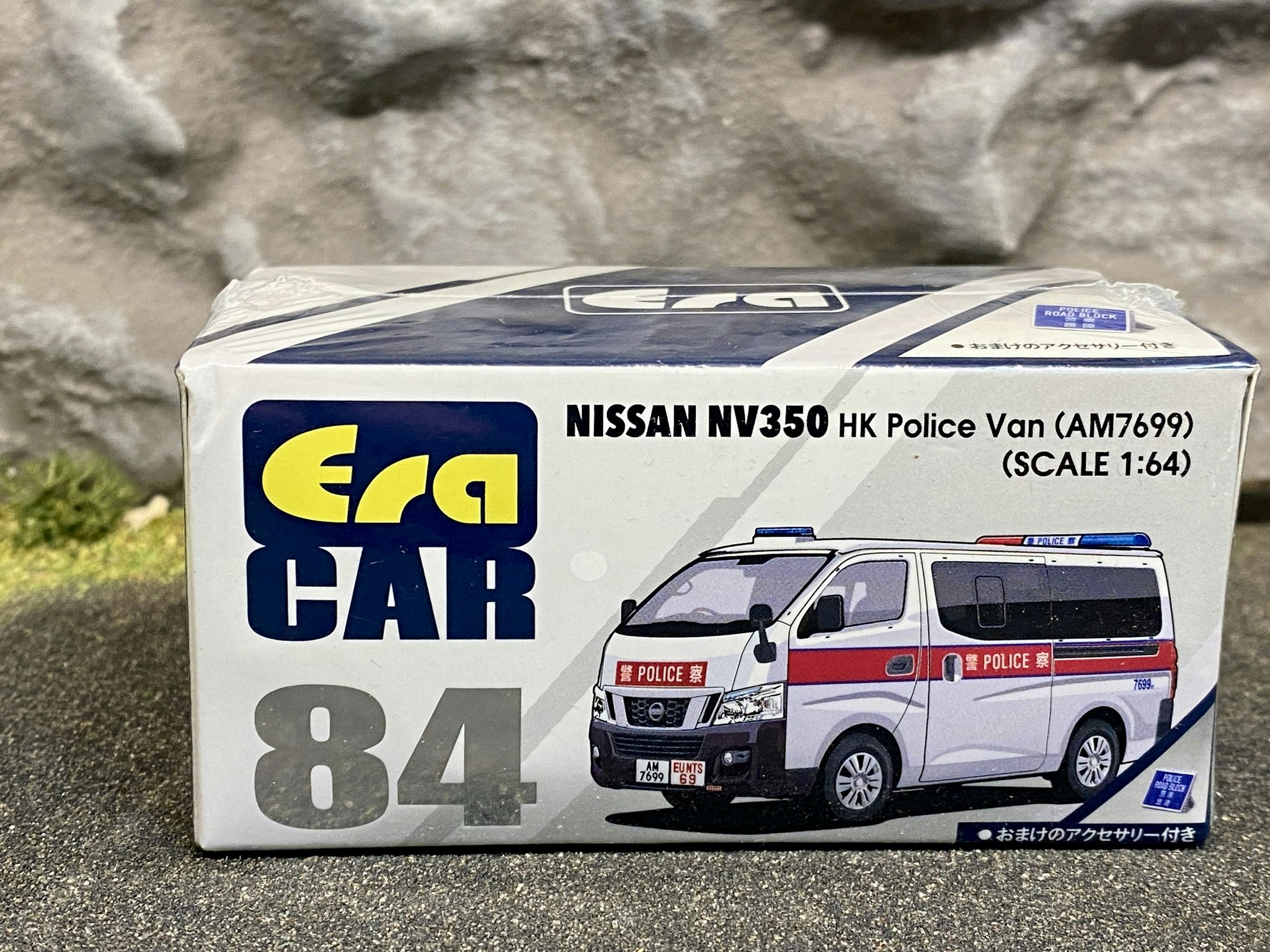 Skala 1/64 Nissan NV350 HK Police Van #84 från ERA CAR