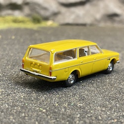 NYHET! Skala 1/87 - Volvo 145, Mörkgul från Brekina