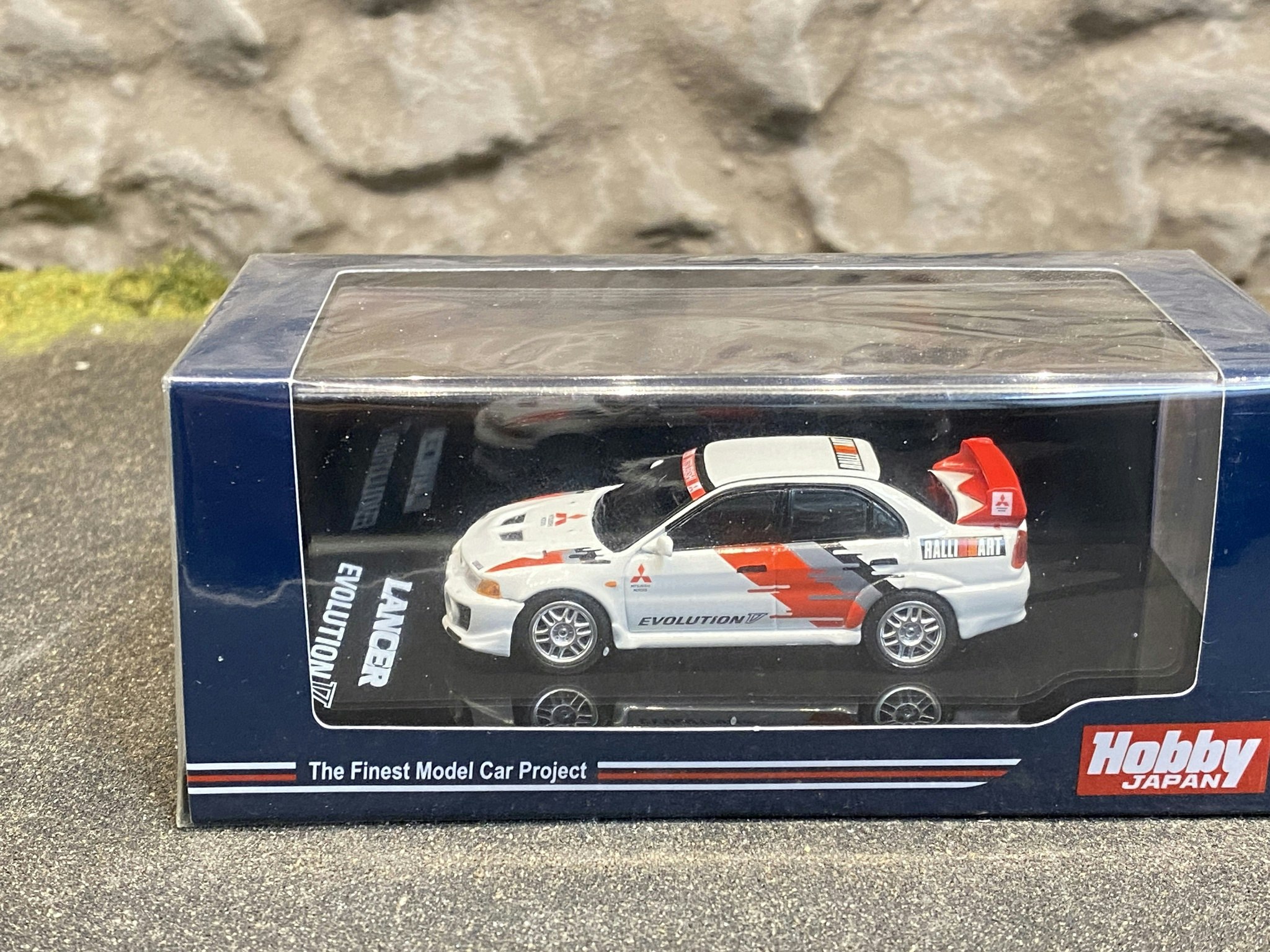 Skala 1/64 Mitsubishi Lancer GSR Evolution V 1998 - HOBBY JAPAN