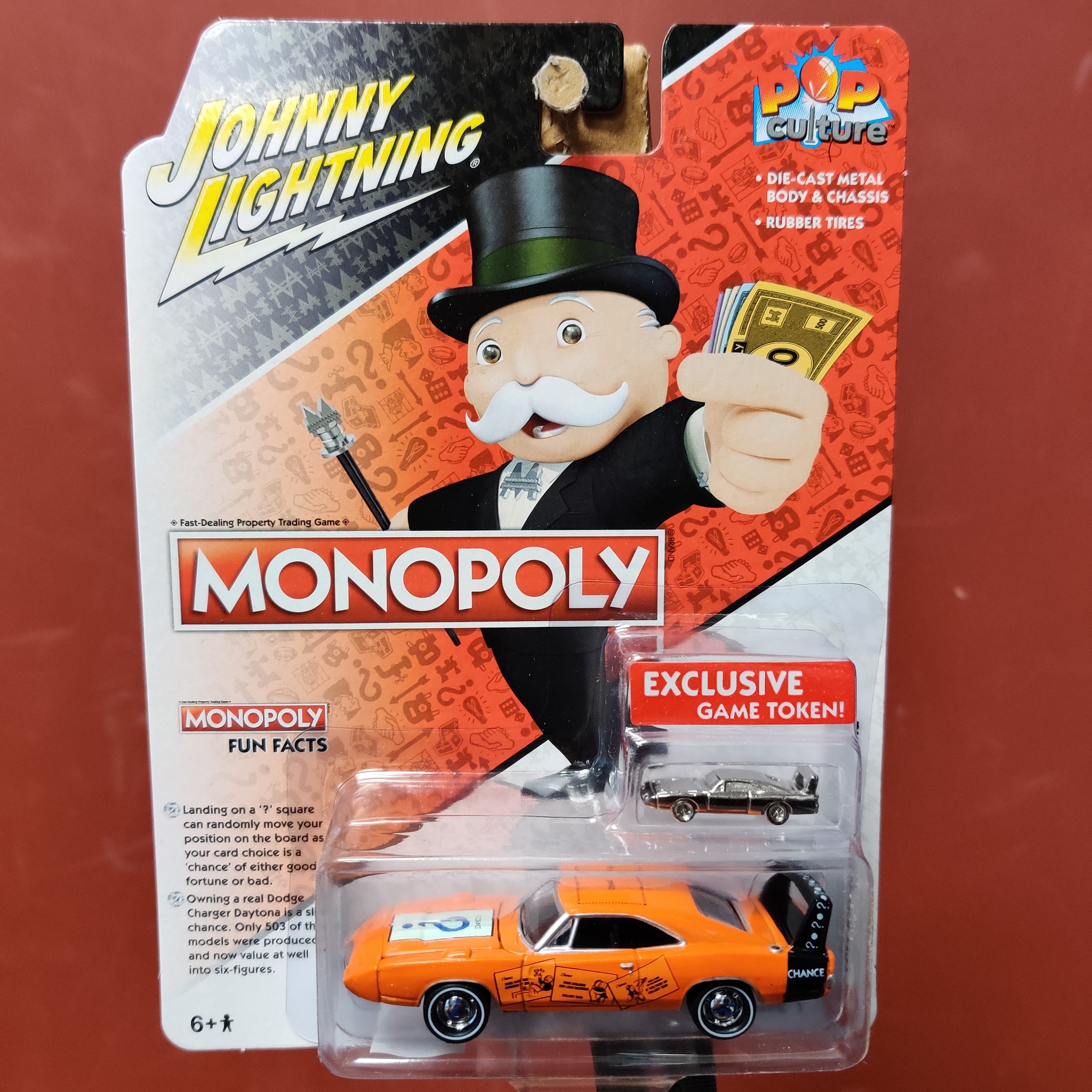 Skala 1/64 - Dodge Charger Daytona 69' "MONOPOLY - POP Culture" från Johnny Lightning