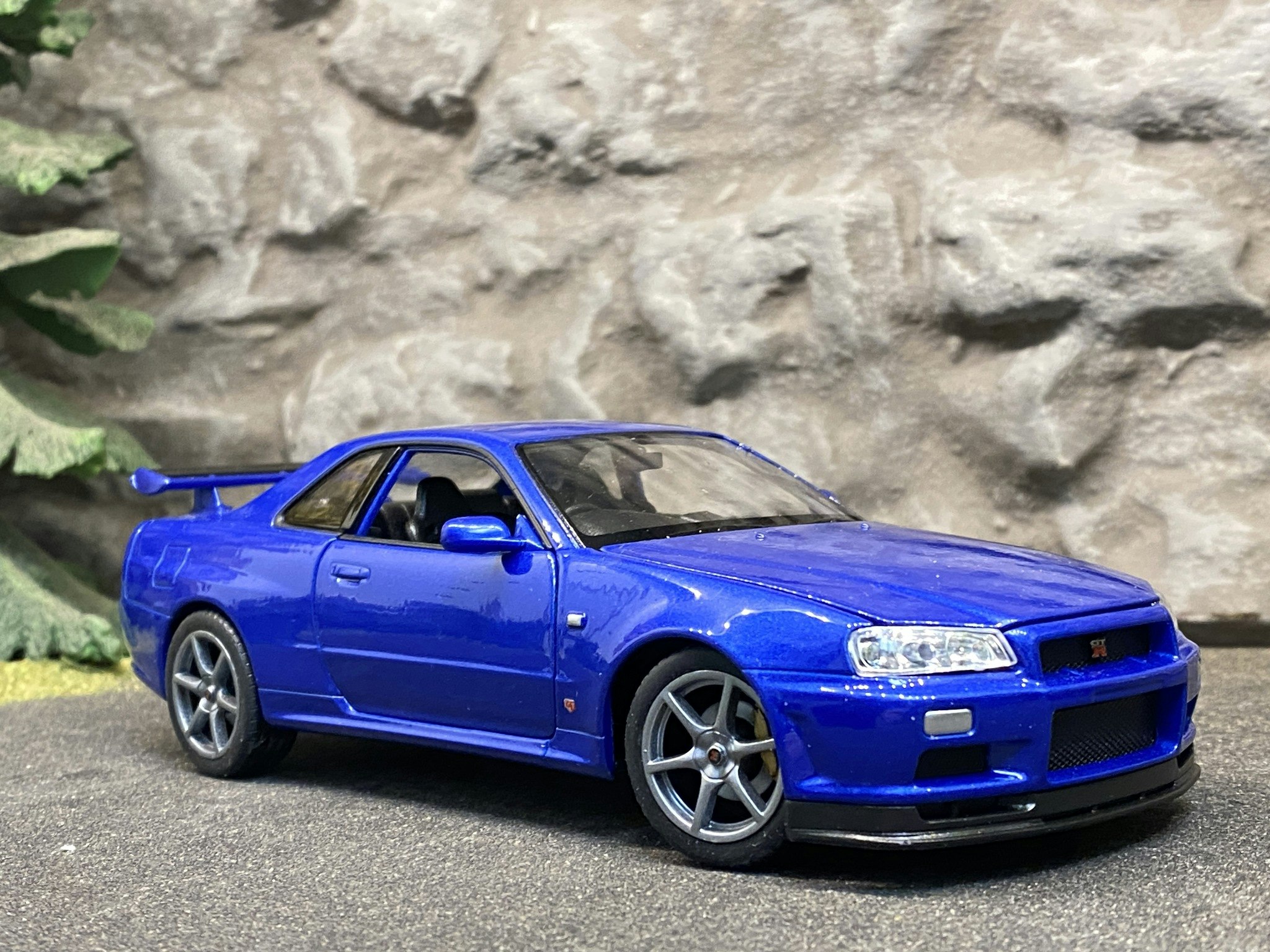 Skala 1/24 Nissan Skyline GT-R (R34), Blå från Nex models / Welly