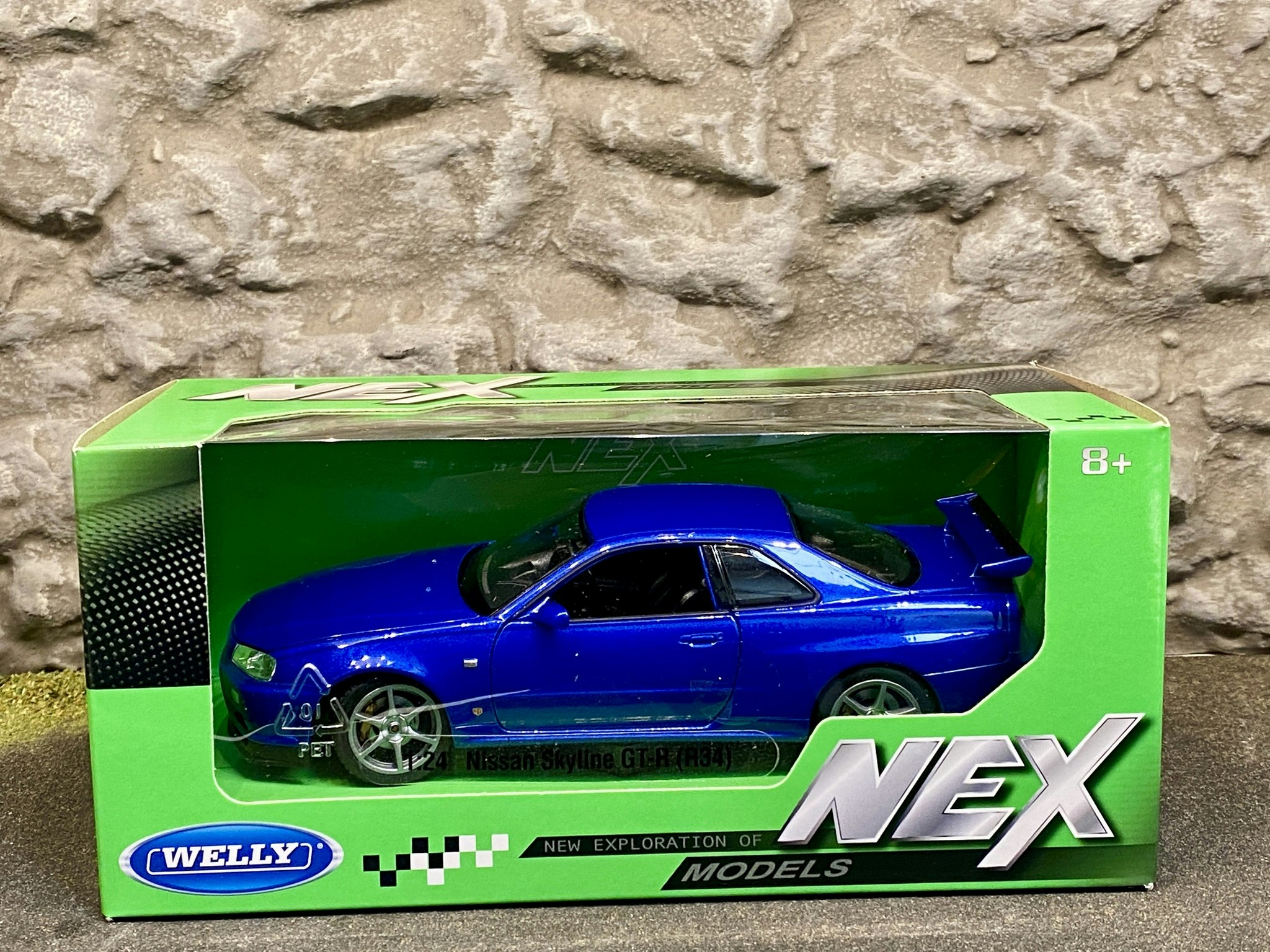 Skala 1/24 Nissan Skyline GT-R (R34), Blå från Nex models / Welly