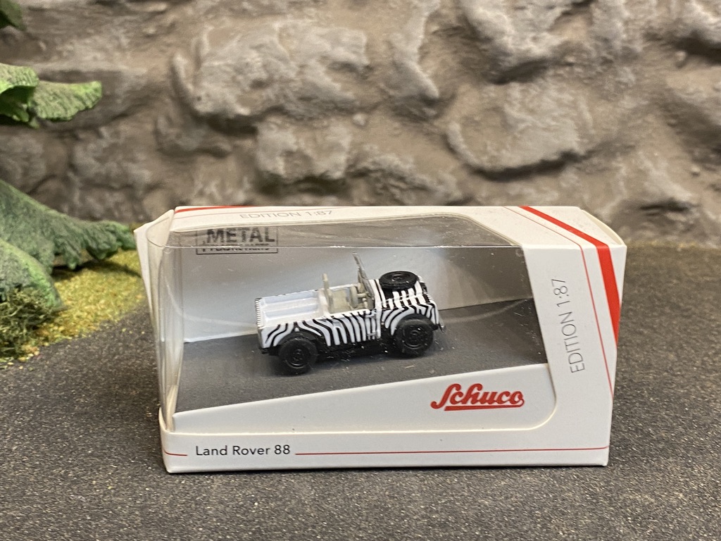 Skala 1/87 H0, Land Rover 88 Zebra-randig fr Schuco