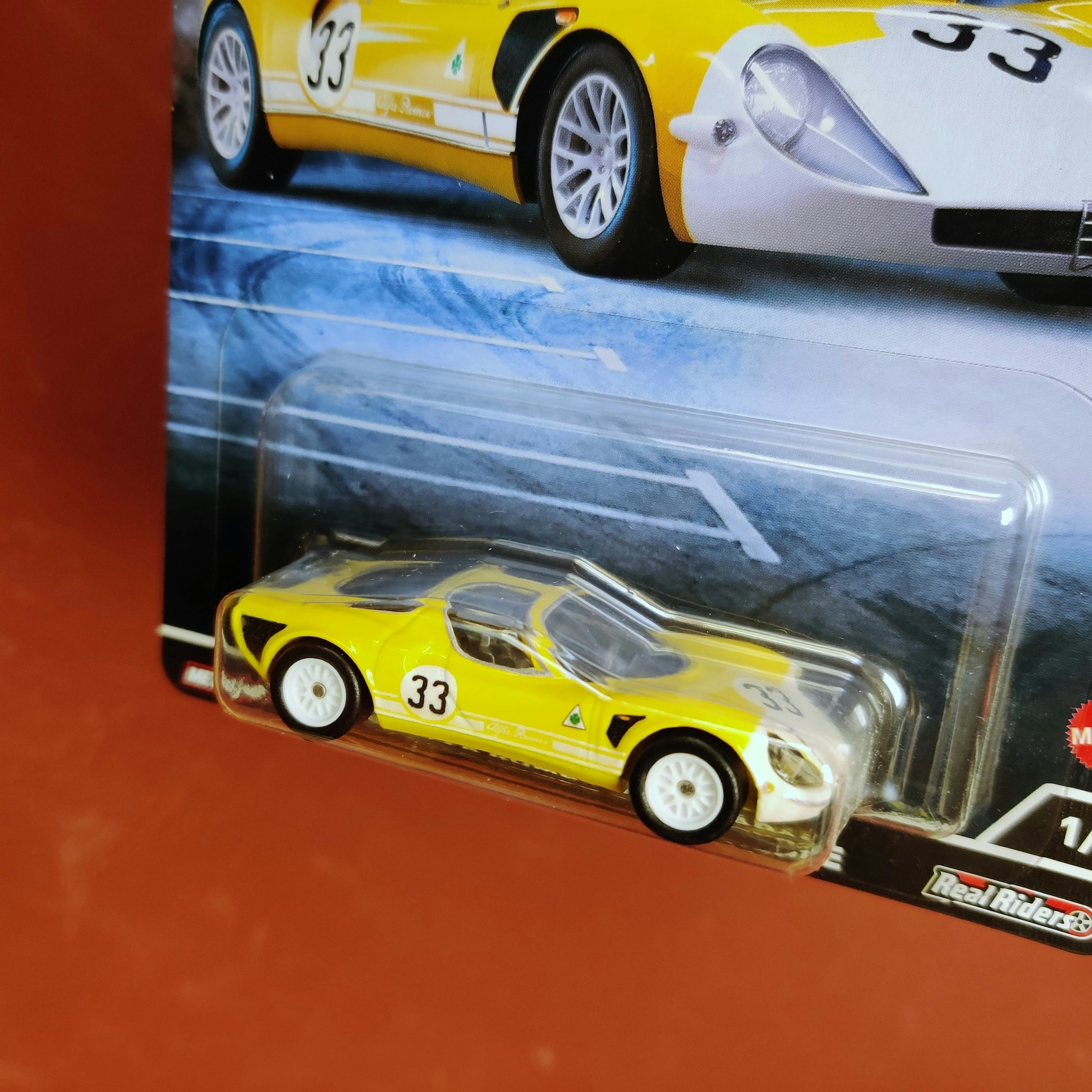 Skala 1/64 Hot Wheels Premium, "Exotic Envy" - Alfa Romeo 33 Stradale 69'