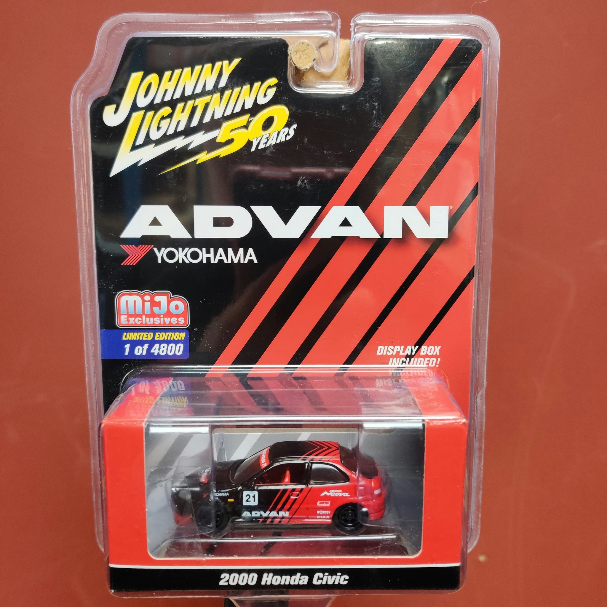 Skala 1/64 Honda Civic 2000 ADVAN YOKOHAMA, svart/röd fr AUTO WORLD Lim ed