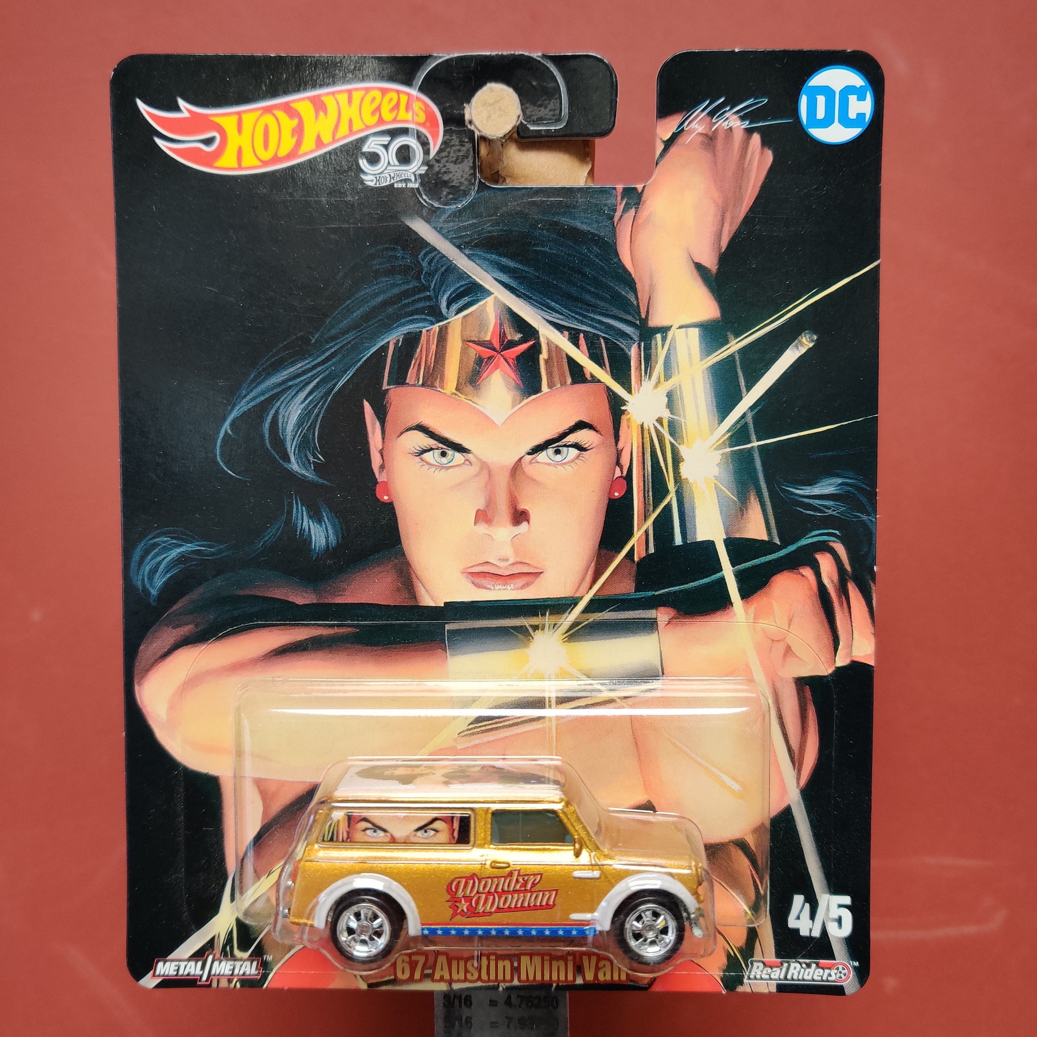 Skala 1/64 Hot Wheels PRENEUM - Austin Mini Van 67' "Wondwe Woman"
