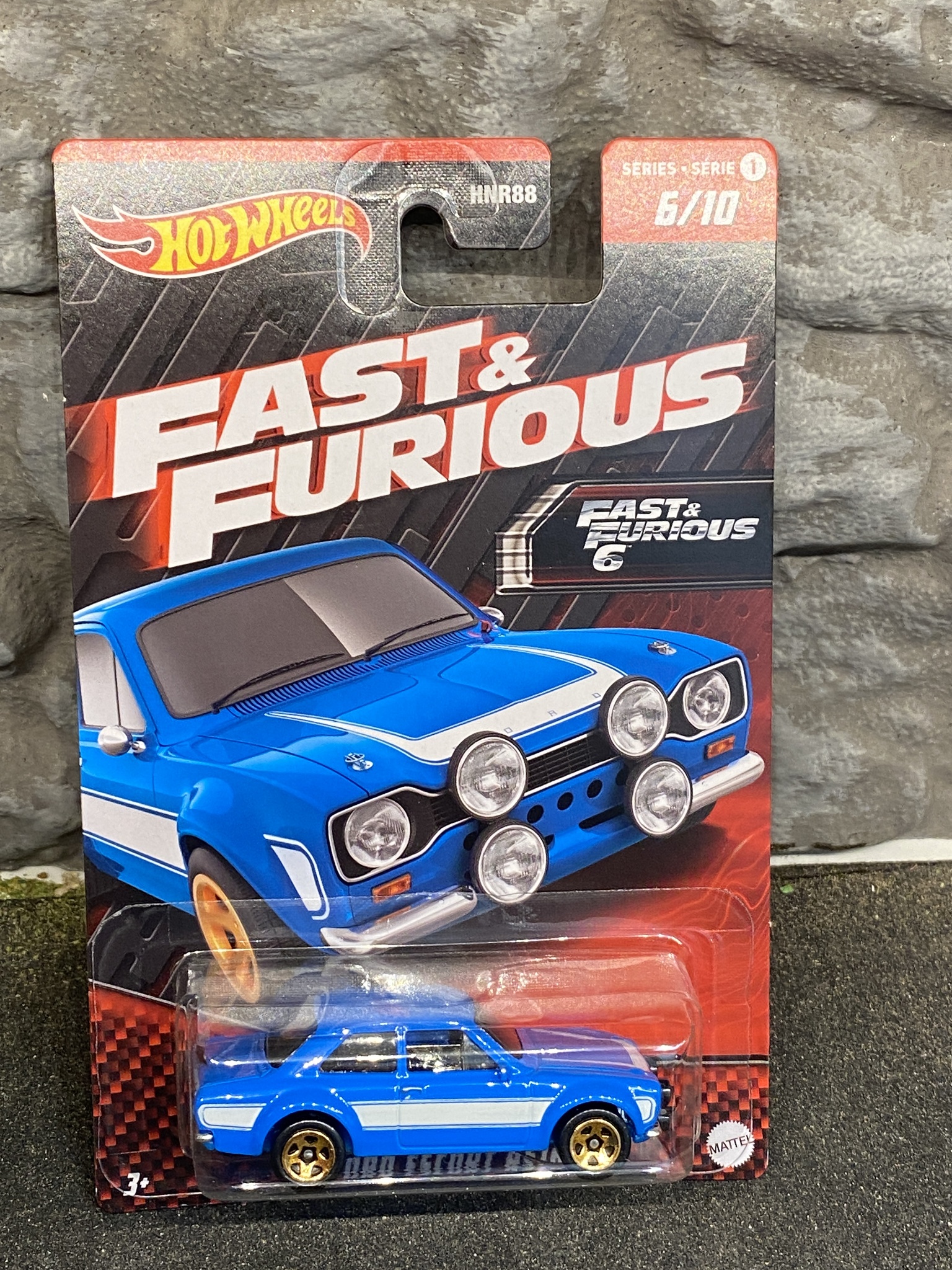 Skala 1/64 Hot Wheels "Fast & Furious" - Ford Escort RS1600 70