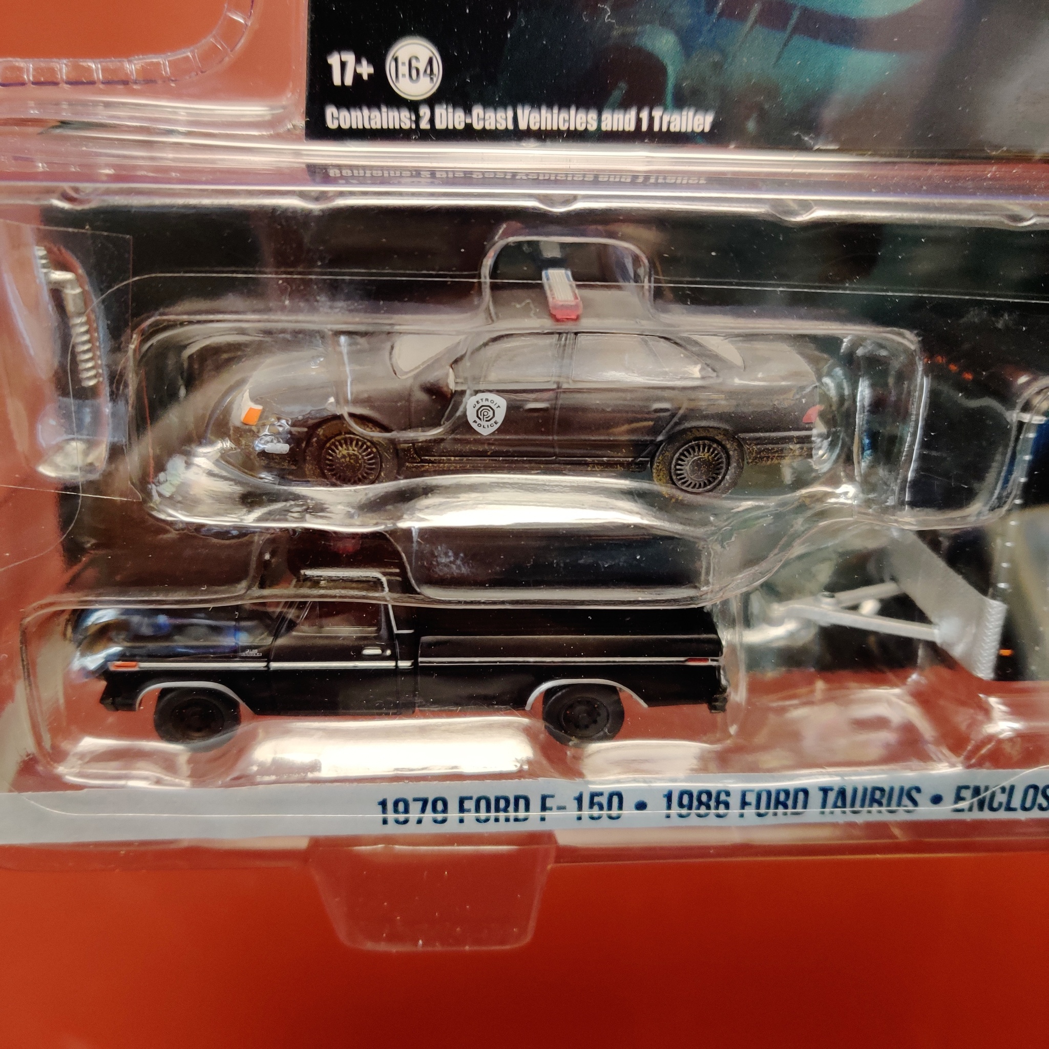 Skala 1/64 - "Robocop 2" Ford Taurus 86' & F-150 79' m Täckt biltrailer f GreenLight Hollywood