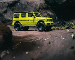 Skala 1/64 Mercedes-AMG G63, Yellow w black roof fr TARMAC works