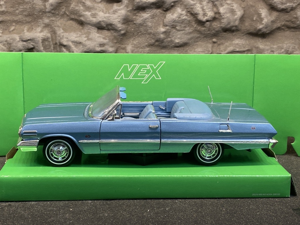 Skala 1/24: Chevrolet Impala Conv. 63', Light blue fr Welly Nex Models