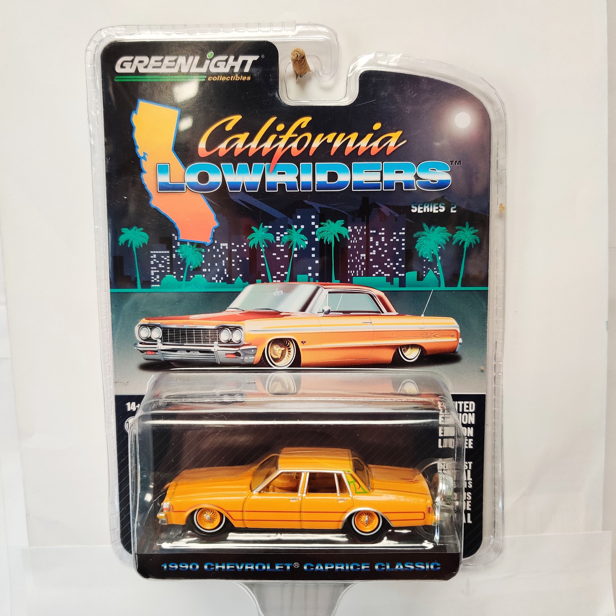 Skala 1/64 Chevrolet Caprice Classic 90' "California LowRiders" orange fr Greenlight