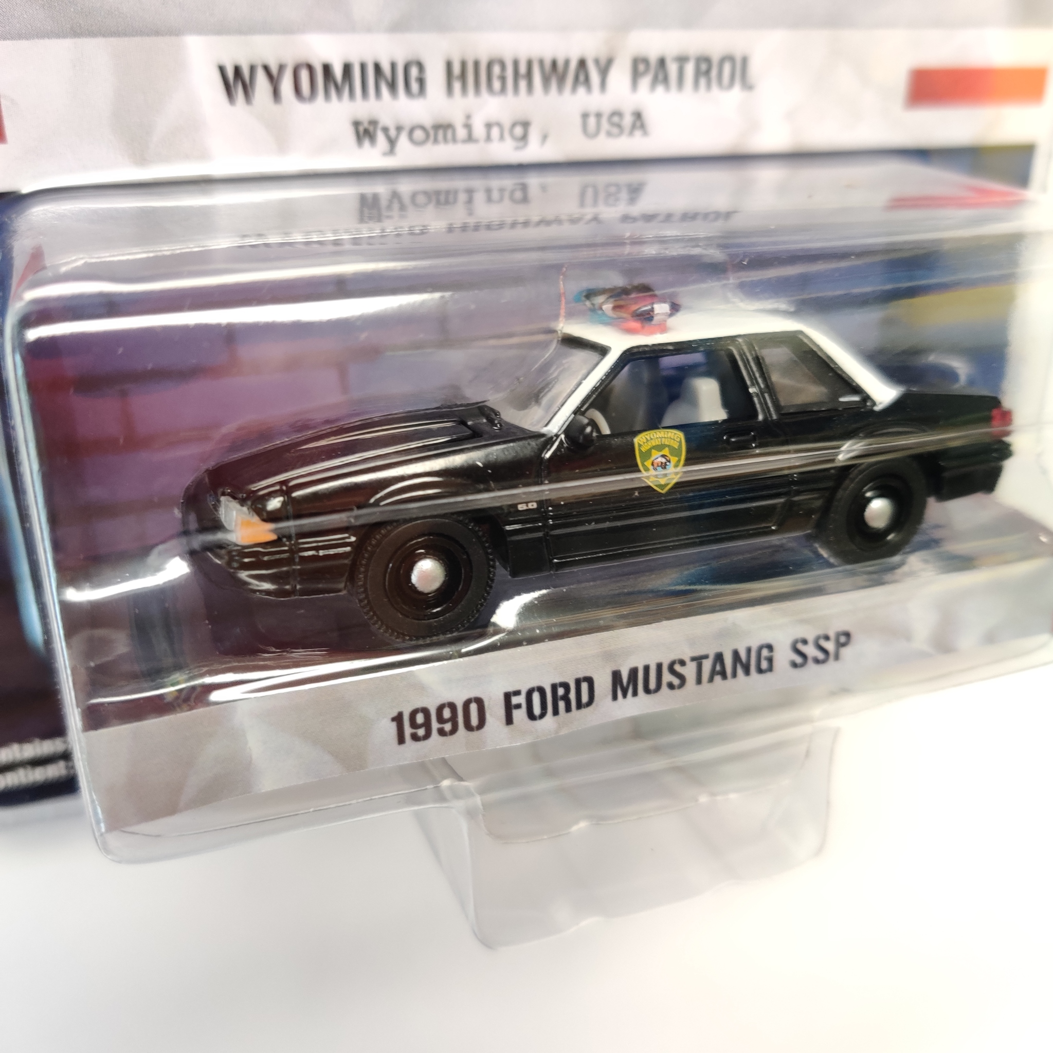 Skala 1/64 Ford Mustang SSP 90' Wyoming "Hot Pursuit" från Greenlight