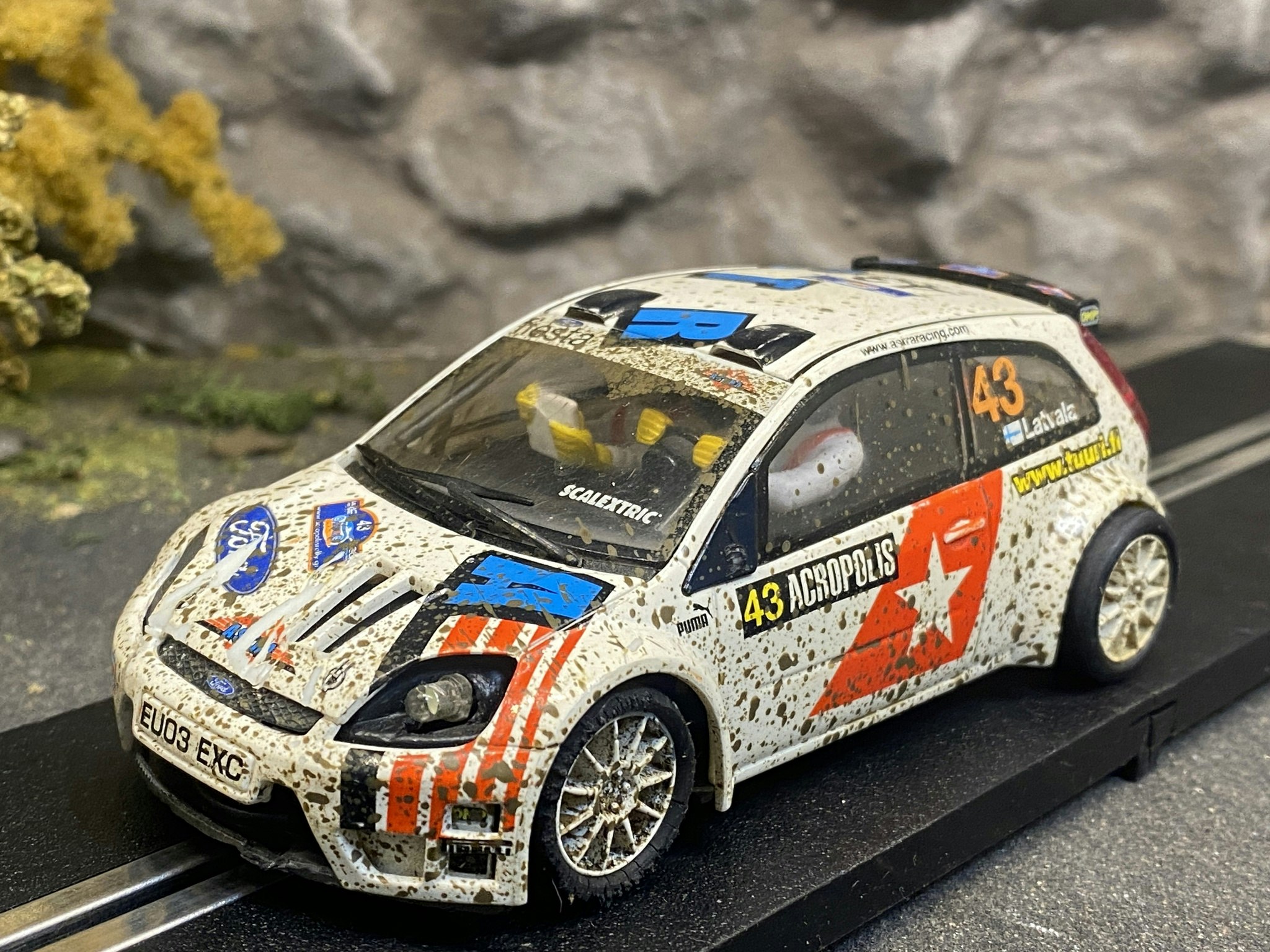 Skala 1/32 Begagnad/Used Analoge slotcar: Ford Fiesta JWRC "Muddy" fr SCX