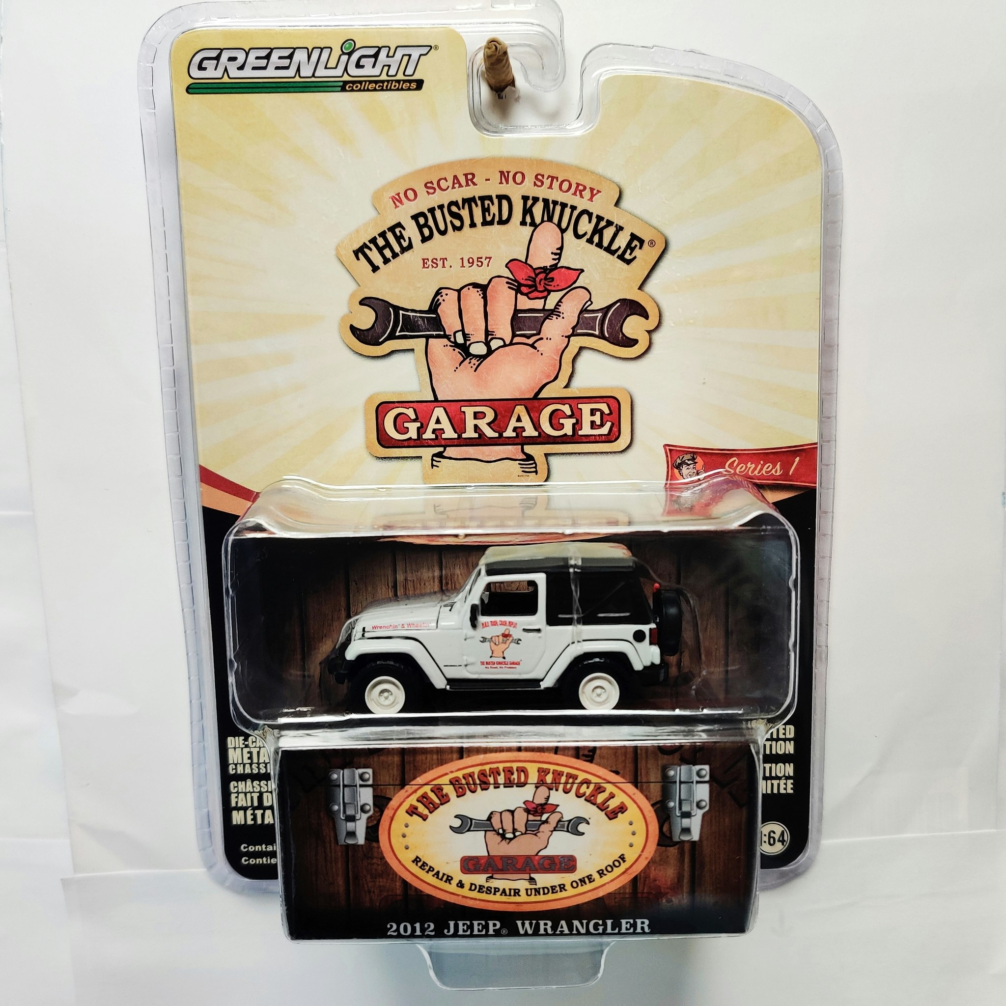 Skala 1/64 Greenlight "The Busted Knuckle Garage" Jeep Wrangler 2012 Ser.1