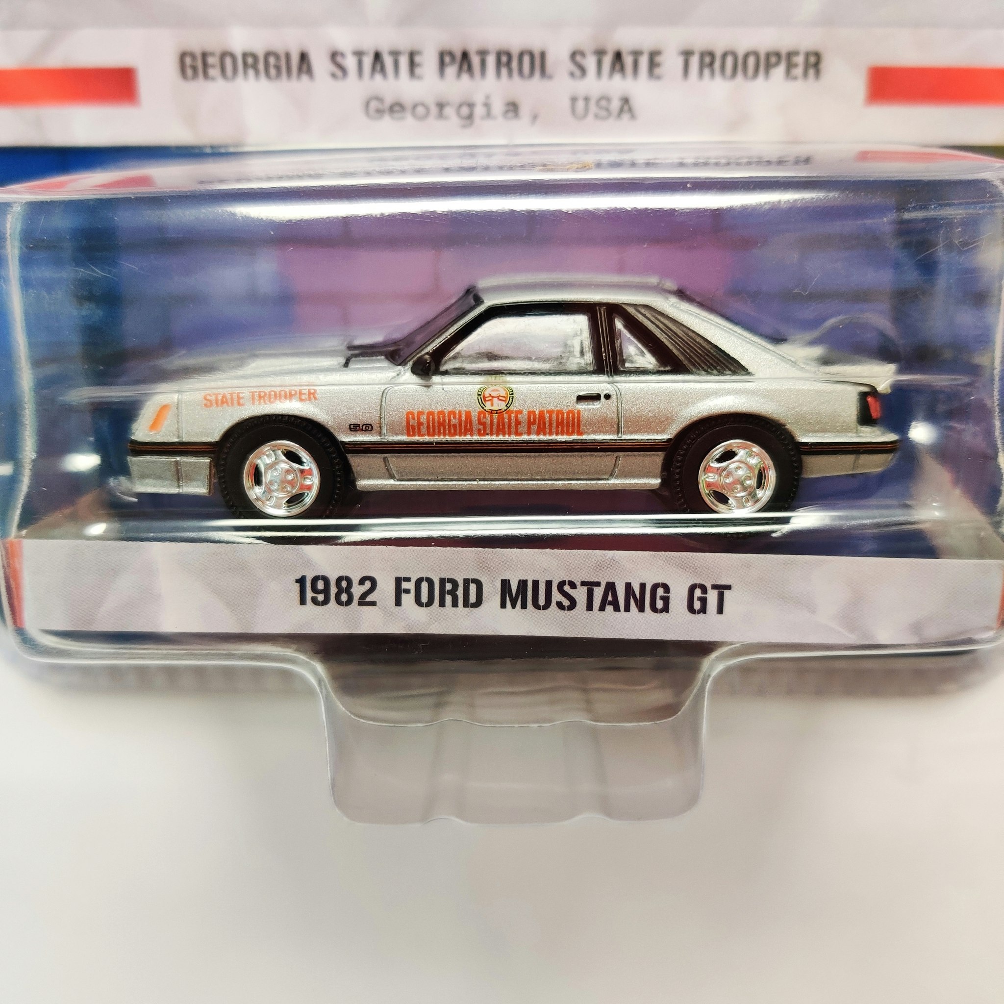 Skala 1/64 Greenlight, "Hot Pursuit", Ford Mustang GT 1982 - Georgia State patrol/trooper