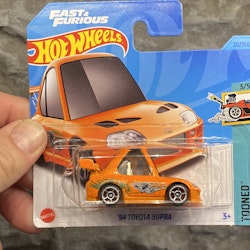 Skala 1/64 Hot Wheels, Toyota Supra 94' - Tooned, Orange