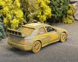 Skala 1/36 Subaru Impreza WRC 2007, Solberg, Weathered fr Kinsmart