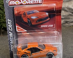 Skala 1/64 fr Majorette - Premium Cars: Toyota GT86, Orange