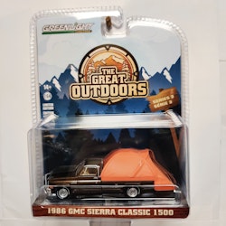 Skala 1/64 Greenlight "The Great Outdoors" 1986 GMC Sierra Classic 1500