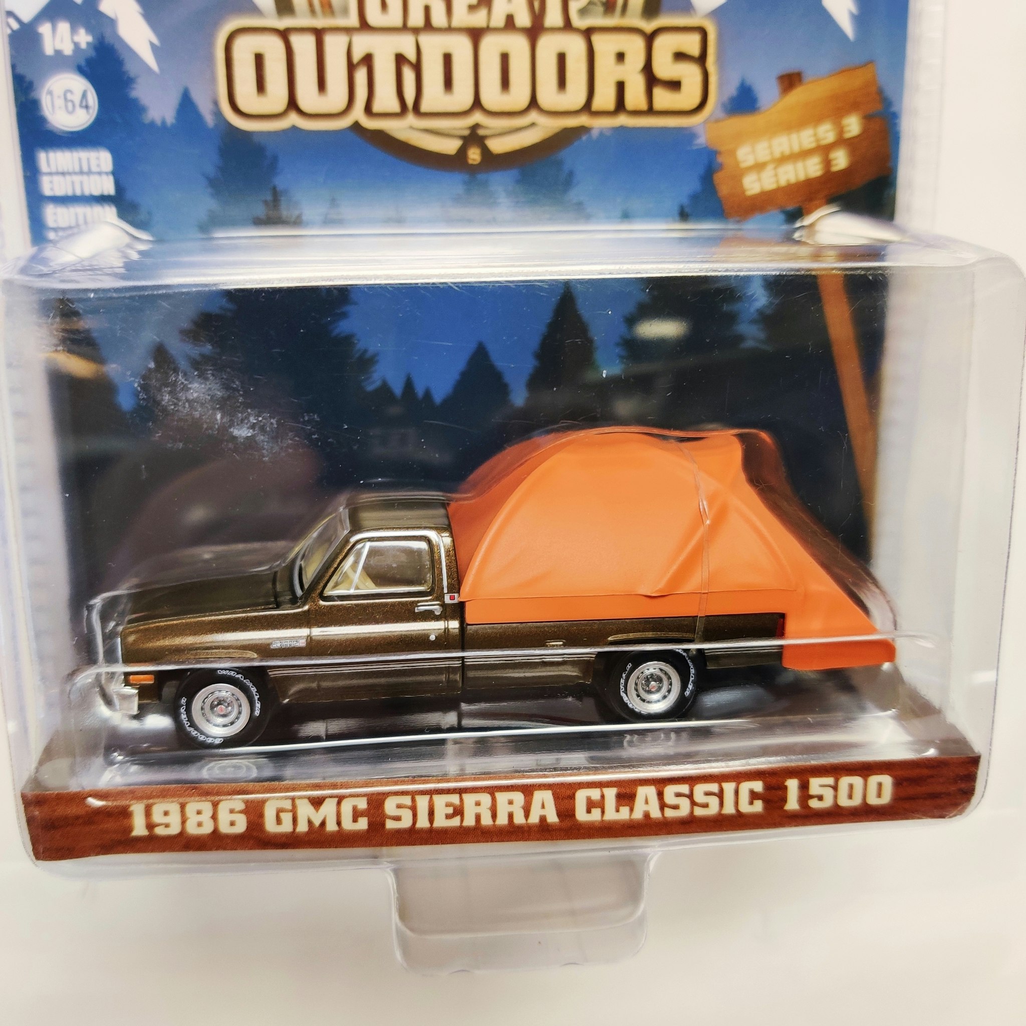 Skala 1/64 Greenlight "The Great Outdoors" 1986 GMC Sierra Classic 1500