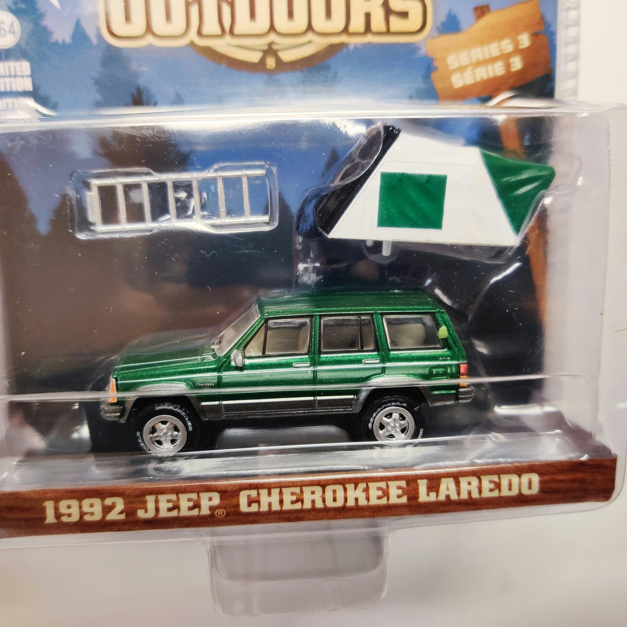 Skala 1/64 Greenlight "The Great Outdoors" 1992 Jeep Cherokee Laredo