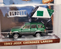 Skala 1/64 Greenlight "The Great Outdoors" 1992 Jeep Cherokee Laredo