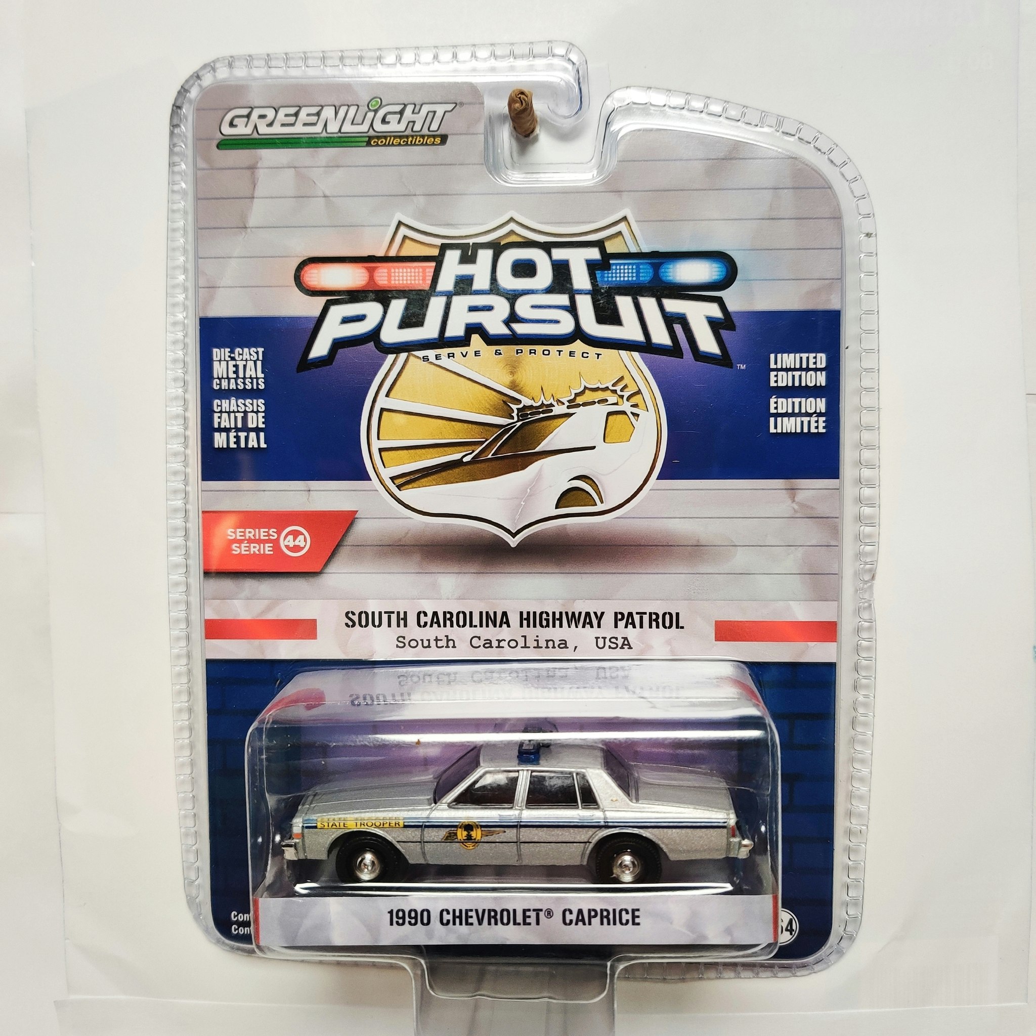 Skala 1/64 Greenlight "Hot Pursuit" 1990 Chevrolet Caprice S.44