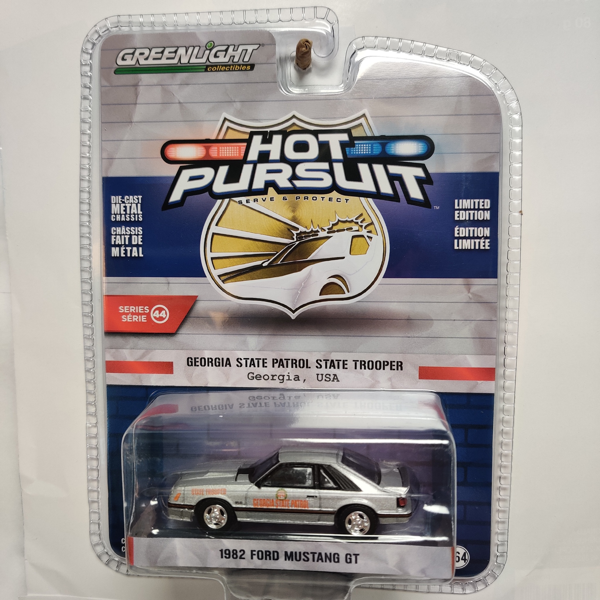 Skala 1/64 Greenlight "Hot Pursuit" 1982 Ford Mustang GT S.44