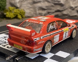 Skala 1/32 Used Analoge slotcar: Mitsubishi Lancer Evo 7 (Muddy) fr SCX