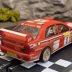 Skala 1/32 Used Analoge slotcar: Mitsubishi Lancer Evo 7 (Muddy) fr SCX