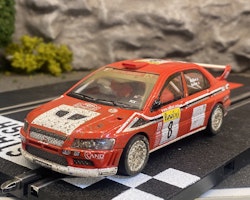 Skala 1/32 Used Analoge slotcar: Mitsubishi Lancer Evo 7 (Muddy) fr SCX