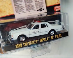 Skala 1/64 Greenlight "Vintage AD Cars" 1980 Chevrolet Impala 9C1 Police Ser.9