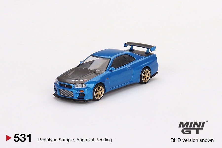 Skala 1/64 Nissan Skyline GT-R (R34) Top Secret Bayside Blue fr MINI GT