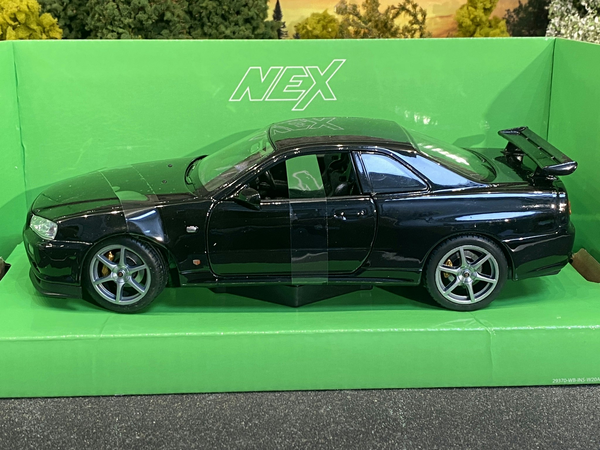 Skala 1/24 Nissan Skyline GT-R (R34) Black fr Nex models / Welly