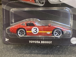 Skala 1/64 Hot Wheels - Vintage Racing Club: Toyota 2000GT #3 Red/yellow