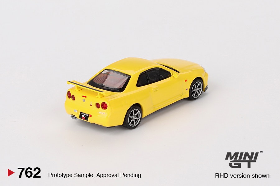 Skala 1/64 Nissan Skyline GT-R (R34) V-Spec Lightning Yellow fr MINI GT (762)