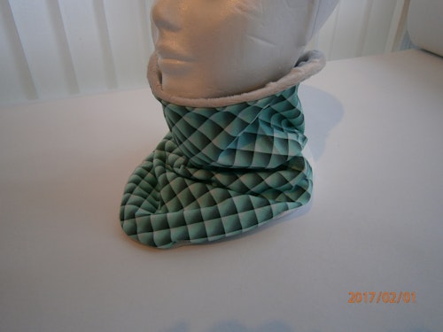 Quiltillusion mintgrön med ljusgrå minky som foder