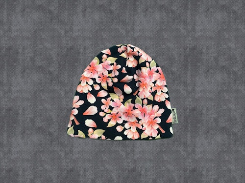 Svart botten med rosa blommor