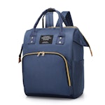 Skötväska i form av ryggsäck i färgen mörkblå