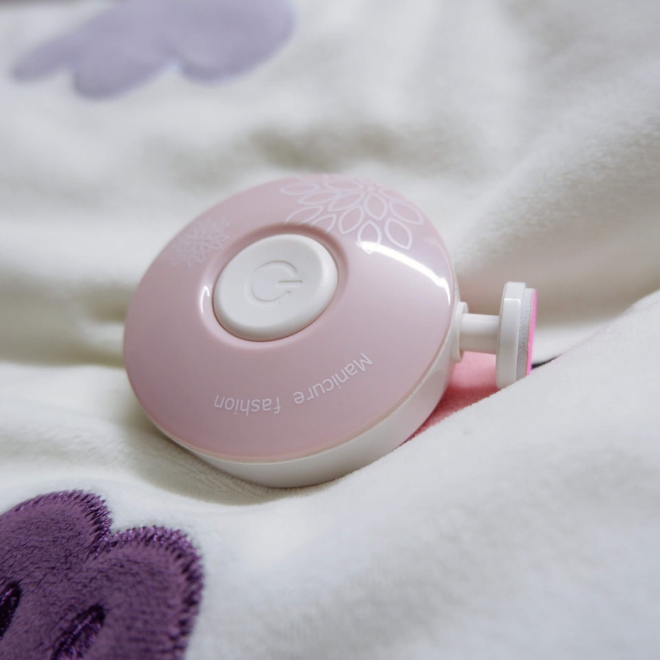 Elektrisk nagelfil för baby i färgen rosa