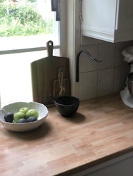 Den vägghängda kapsylöppnaren